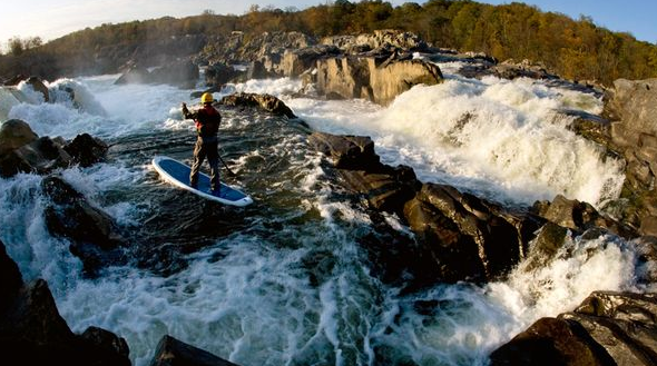 White water stand up paddleboarding 